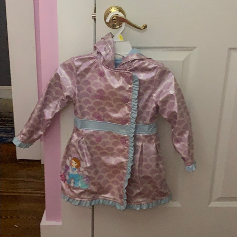 Beautiful raincoat with Princess Sofia .